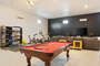 Your very own game room, media room and gym with your choice of billiards among others