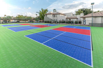 Community pickleball courts are fun for guests of all ages.