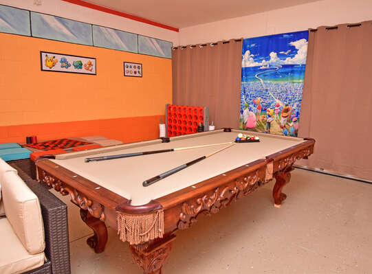 Garage converted to games room with pool table and pocket monster theme