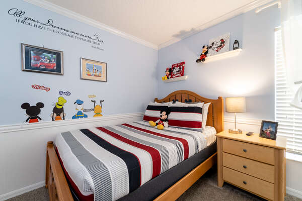 Bedroom 3 has a famous mouse theme and a full bed