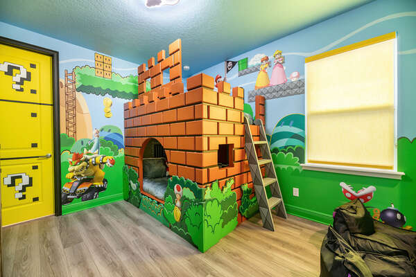 Kids will love this Super Mario-themed bedroom with a double/double bunk bed