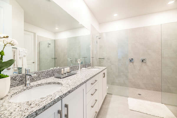 The master suite features an en suite bathroom with a double shower