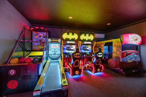 This exciting games room features Miami Heat basketball, skee-ball, a Fast and the Furious Super Bikes 2 racer, Deadstorm Pirates, dual Batman racers, and air hockey