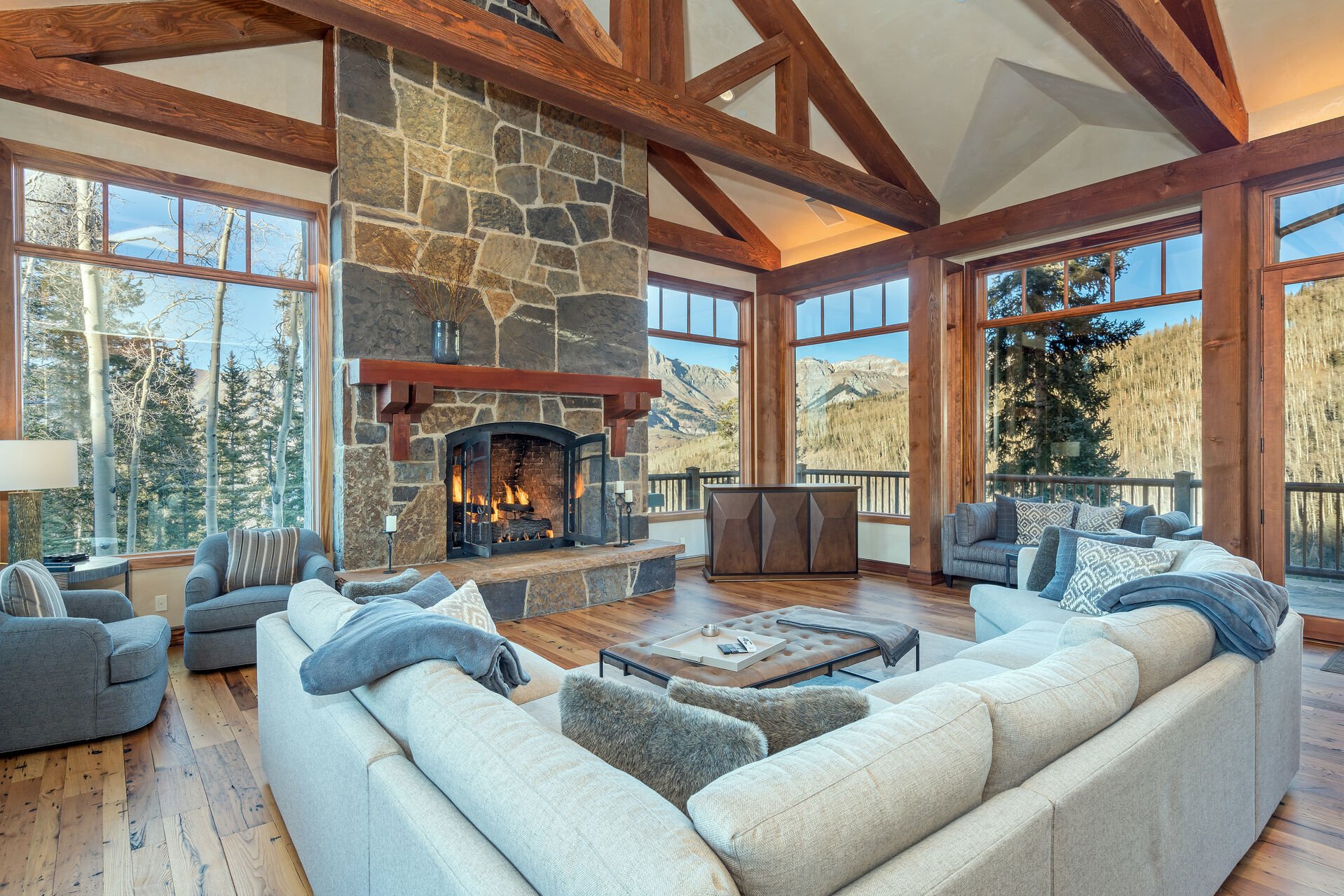 A large living area with a grand fireplace