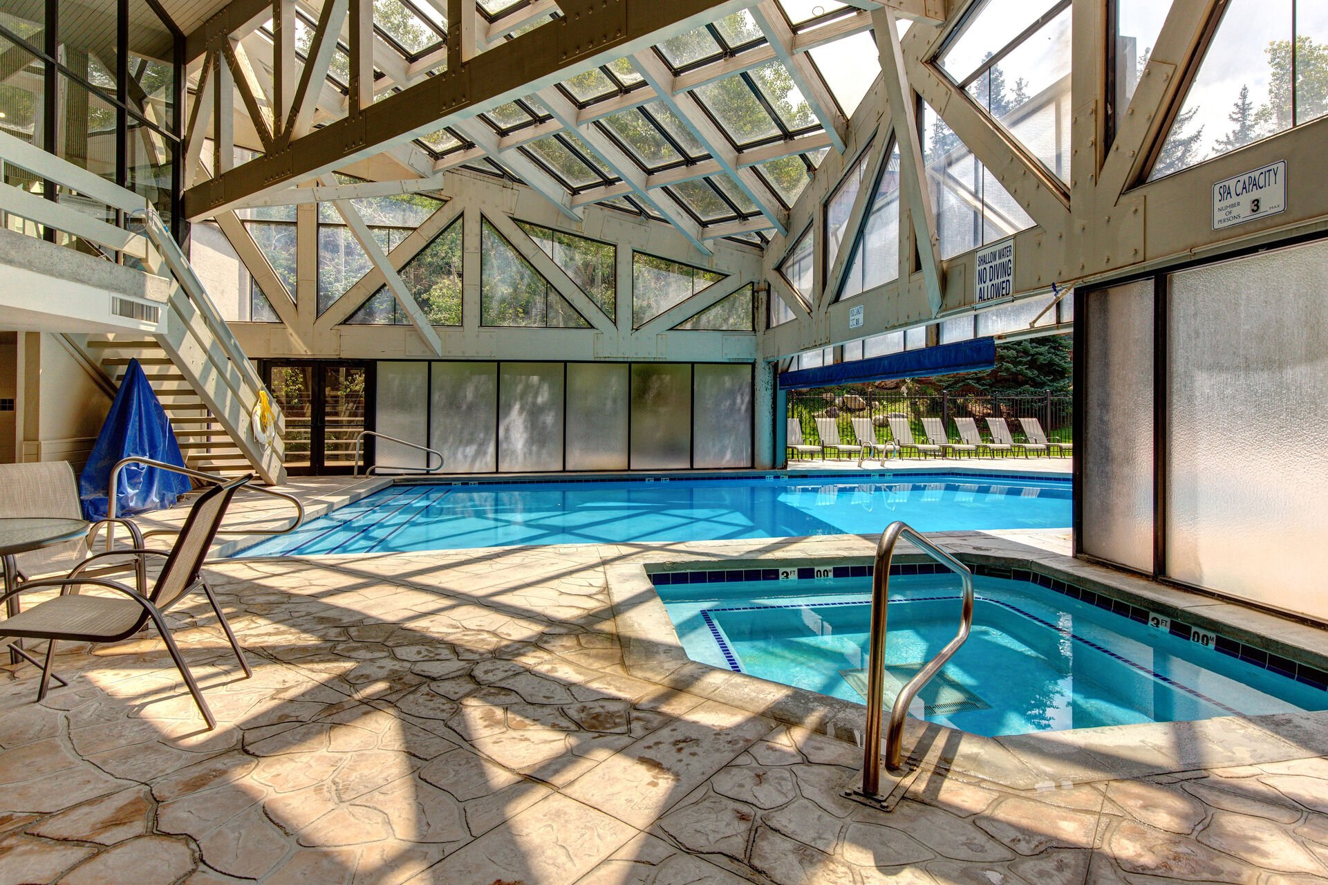 Communal indoor/outdoor. pool and hot tub
