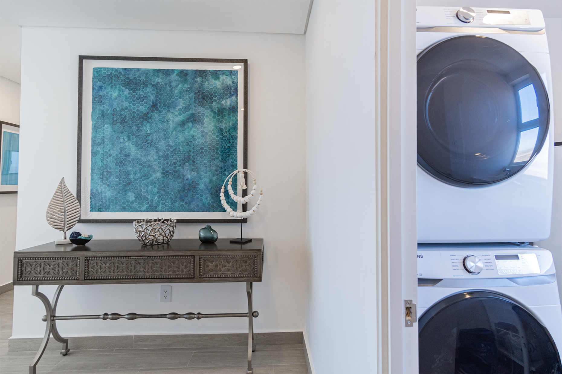 From the hall you access the utility room, offering a washer and dryer.