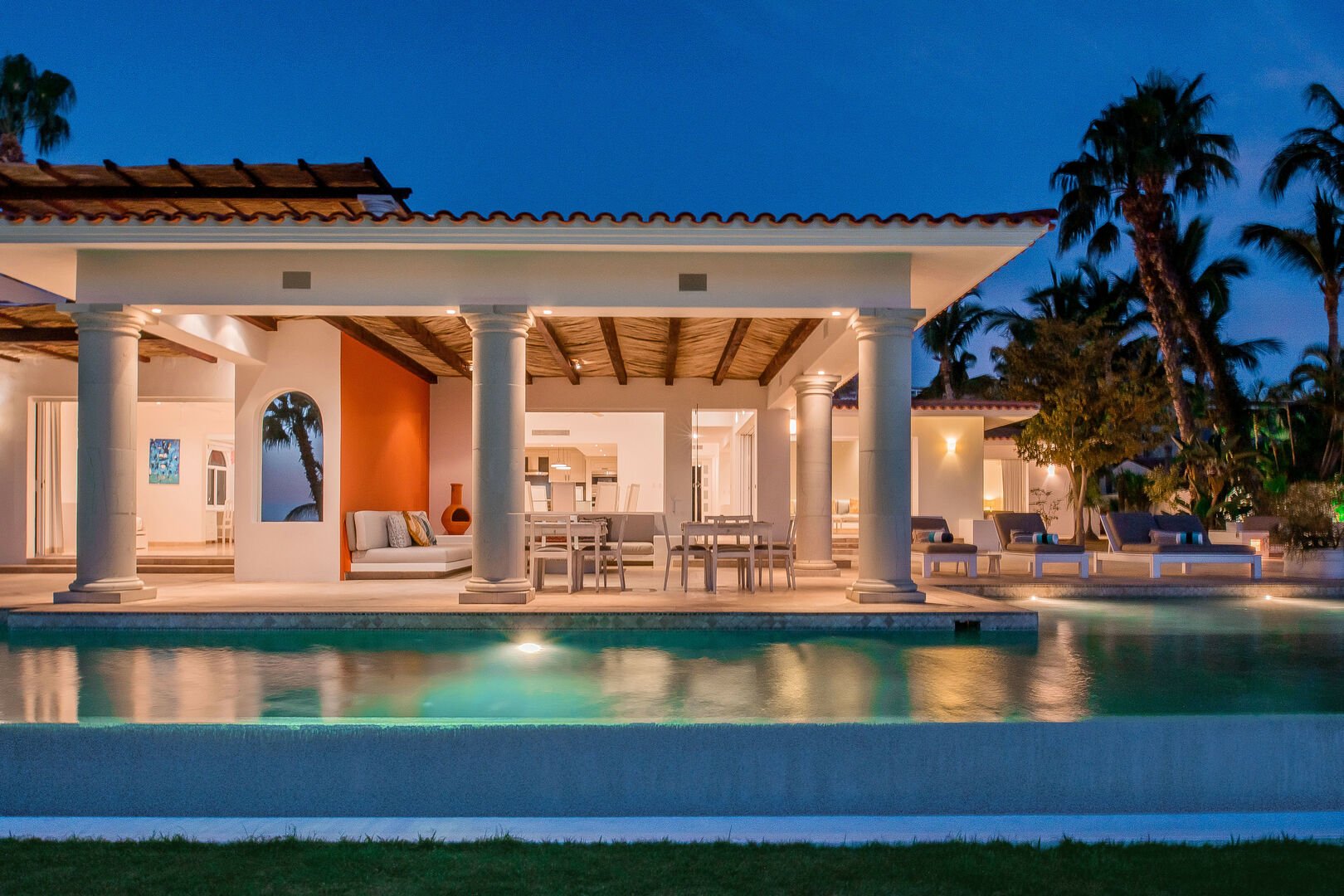 Frontal view of this luxury villa rental in Los Cabos showing the outdoor pool and patio.