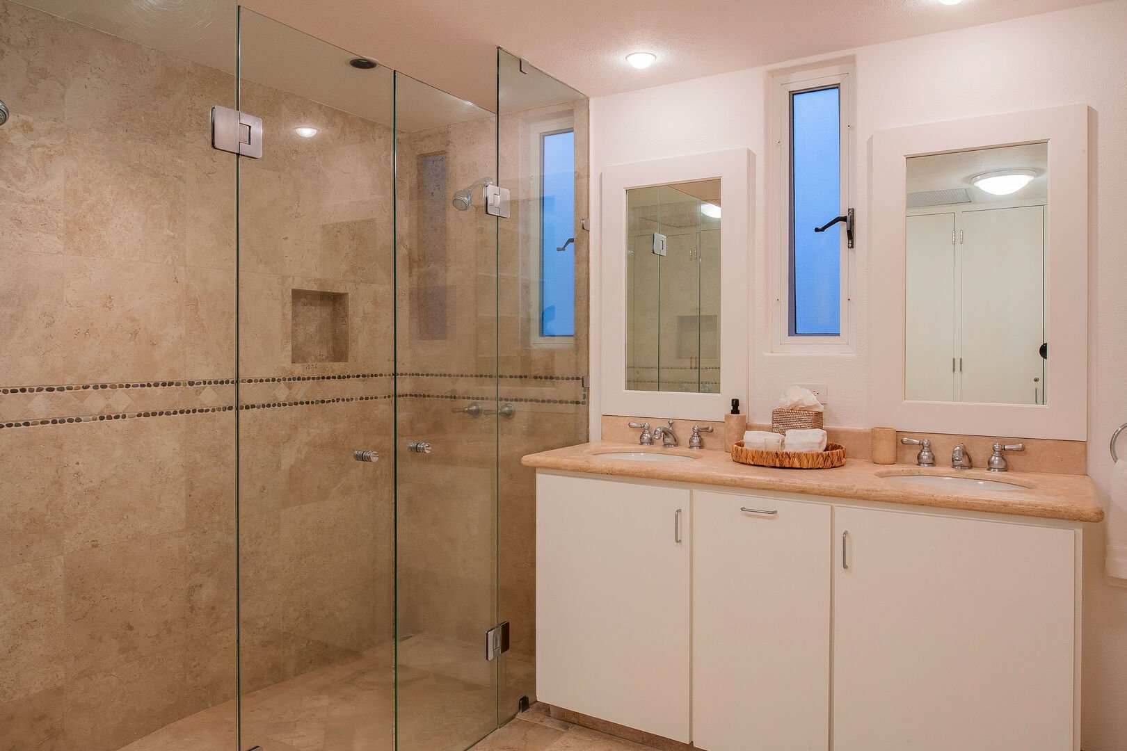 A large shower with a double vanity in the 6th bathroom.