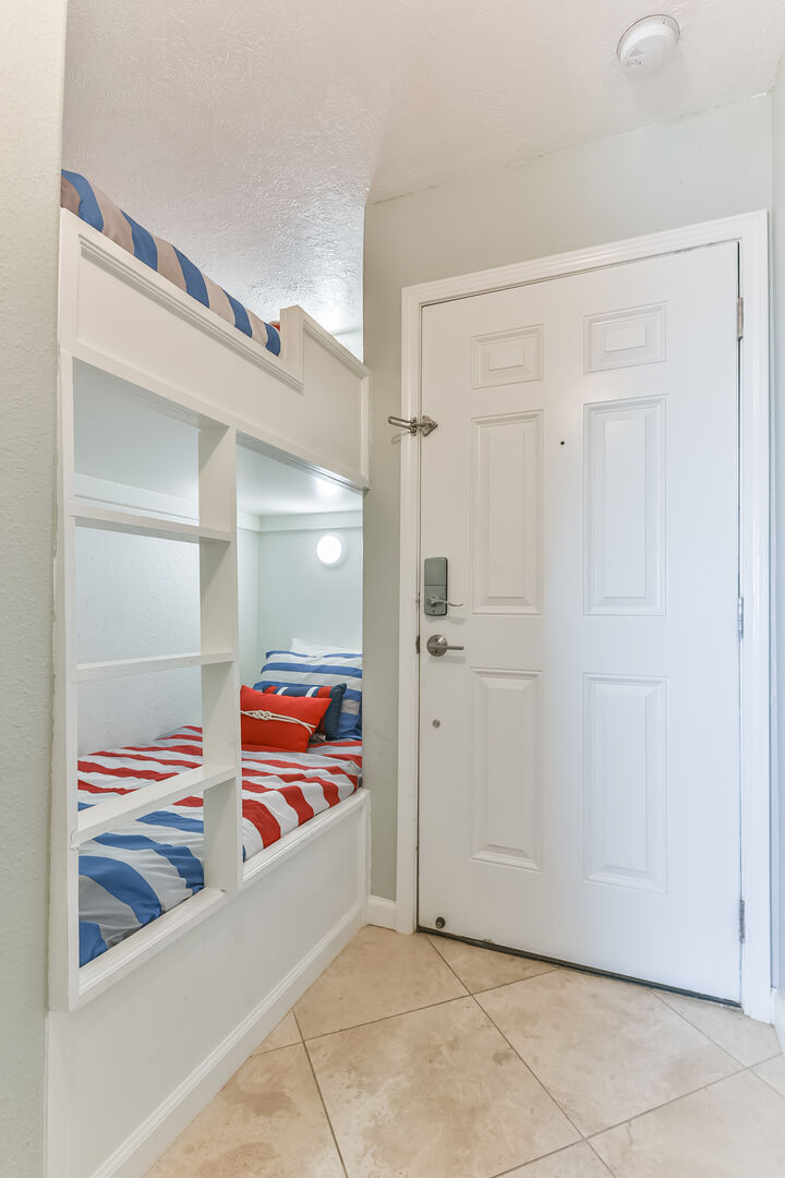 Bunk beds are located in the hall for kids and adults alike