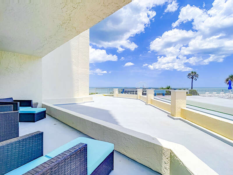 Lovely view of the ocean from the ground floor balcony.  Walk right out to the beach and pool area.