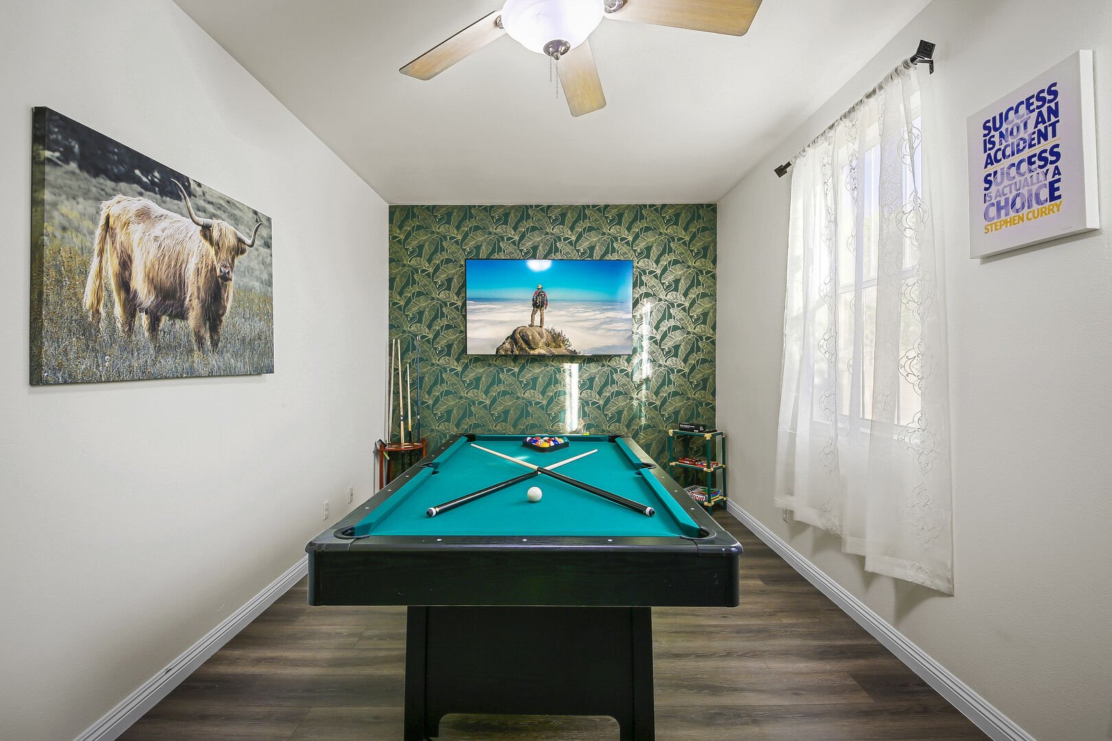Challenge your friends and family to a tournament in 9-ball in the attached game room from bedroom 4.