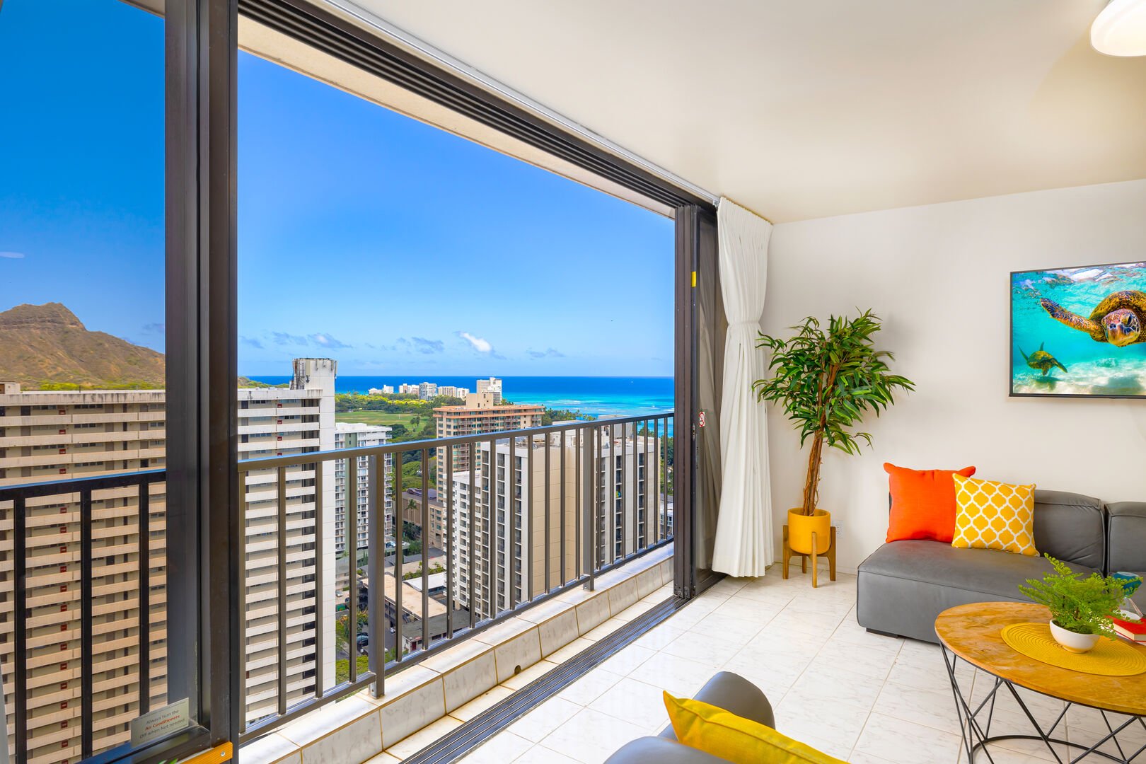 Stunning ocean view and Diamond Head View from the living room.