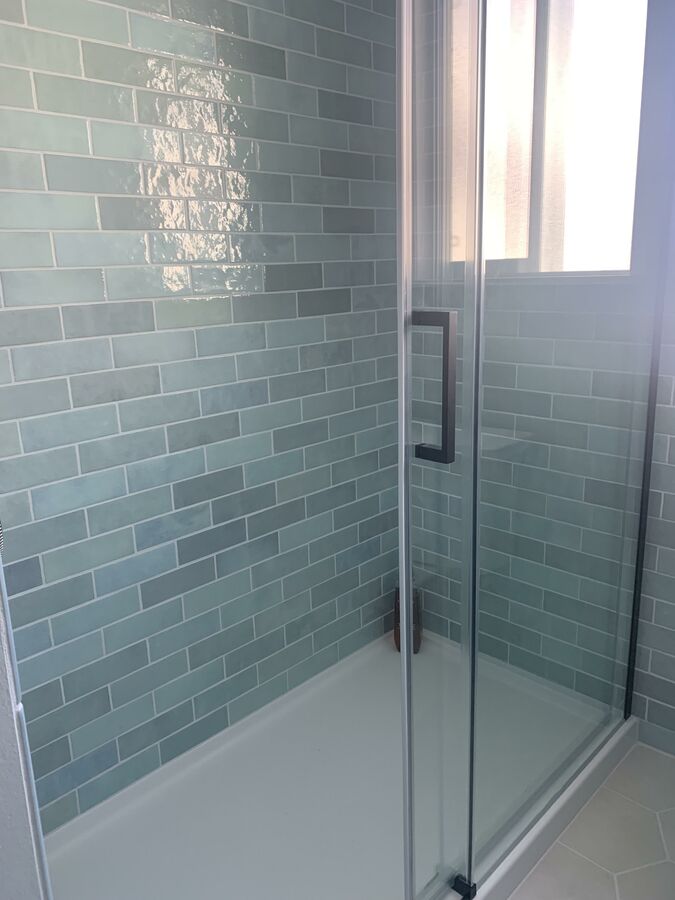 Beautifully fully tiled walk in shower.