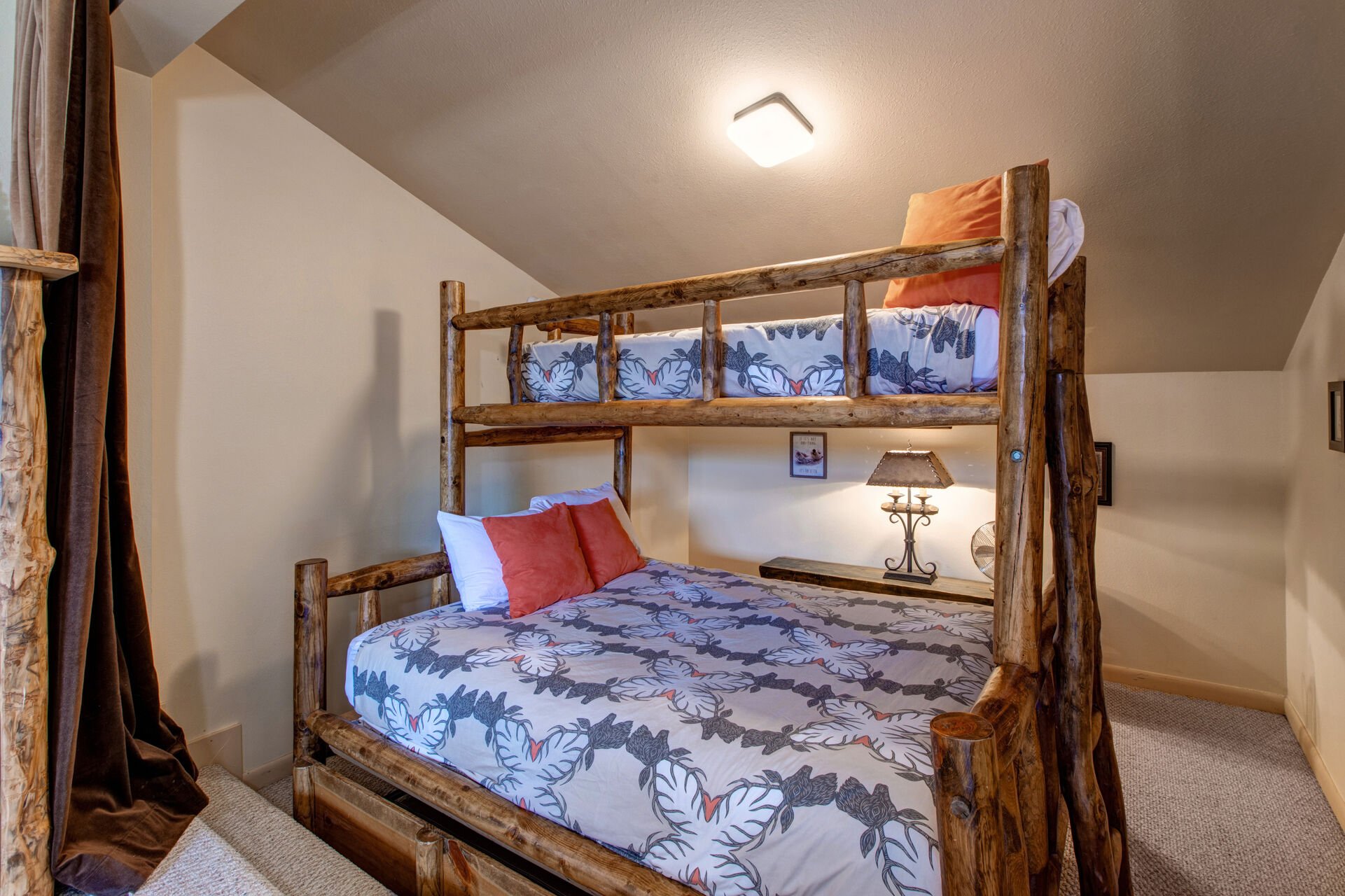 Upper Level Master Suite with king bed, twin over queen bunk, TV, walk-in closet, and en suite bathroom