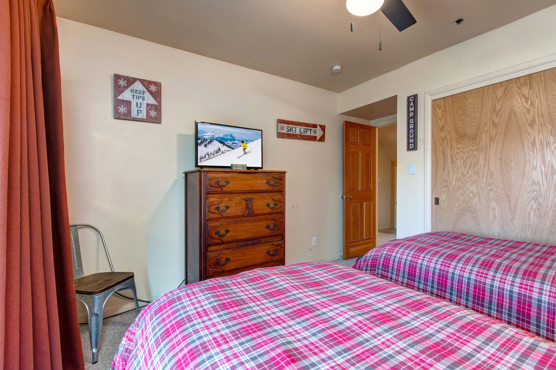 Bedroom 3 with 2 twin beds, TV, private patio entrance and full bath access