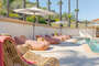 Day beds by the pool are ready for you!