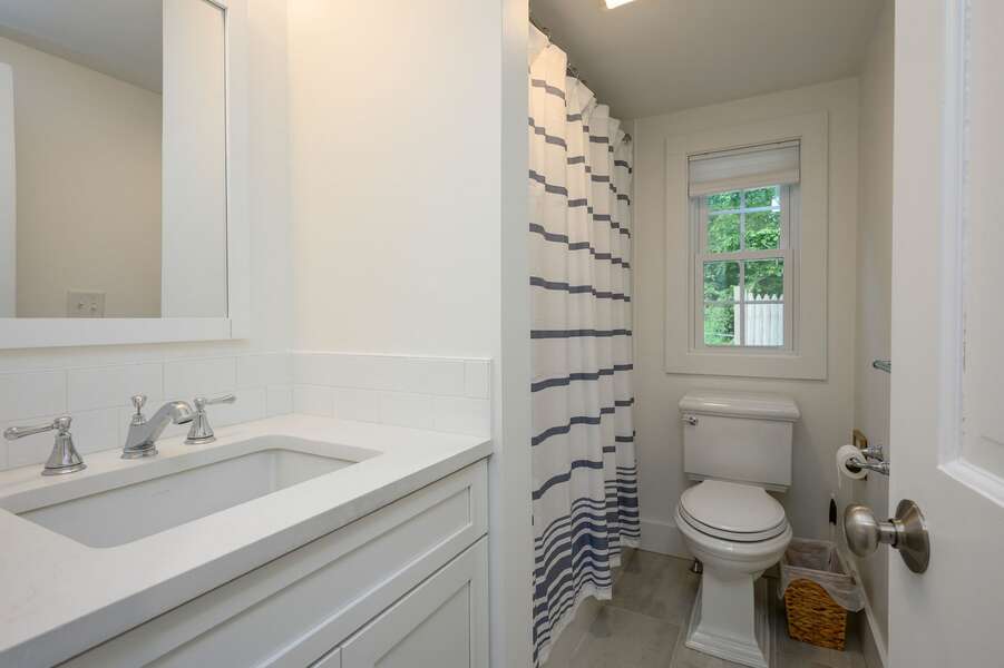 Bathroom #1 first floor full with tub shower combo-31 Bayview St- Chatham- Cape Cod