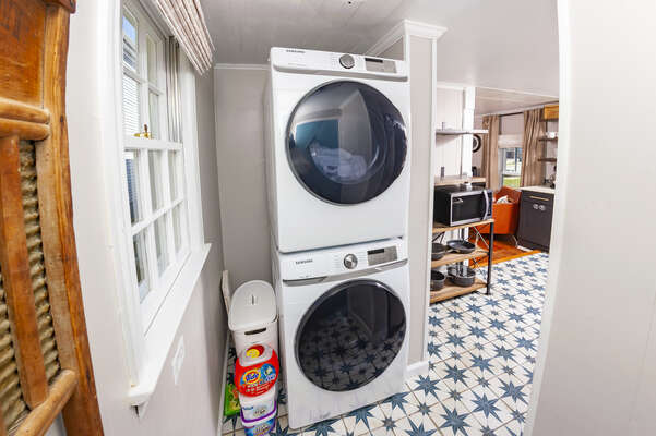 Full size washer and dryer located right off the kitchen. We even supply you with several Tide pods.