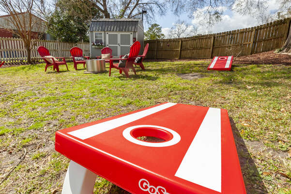 Play a fun game of corn hole while waiting for dinner.
