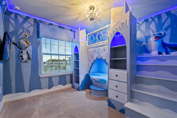 Beautiful ice queen themed bedroom with built in bunk beds and flat screen TV