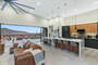 Bright open living space with breathtaking and vast views of the Joshua Tree mountains and valley