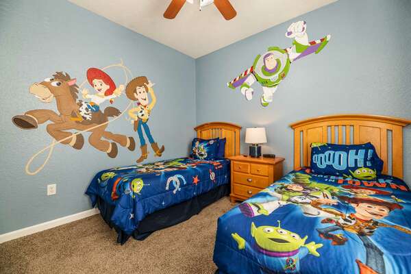 This kids' themed bedroom offers two twin beds
