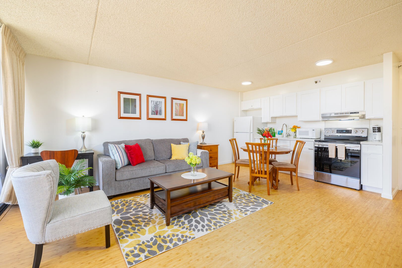 Spacious living space for your relaxation with an open fully equipped kitchen.