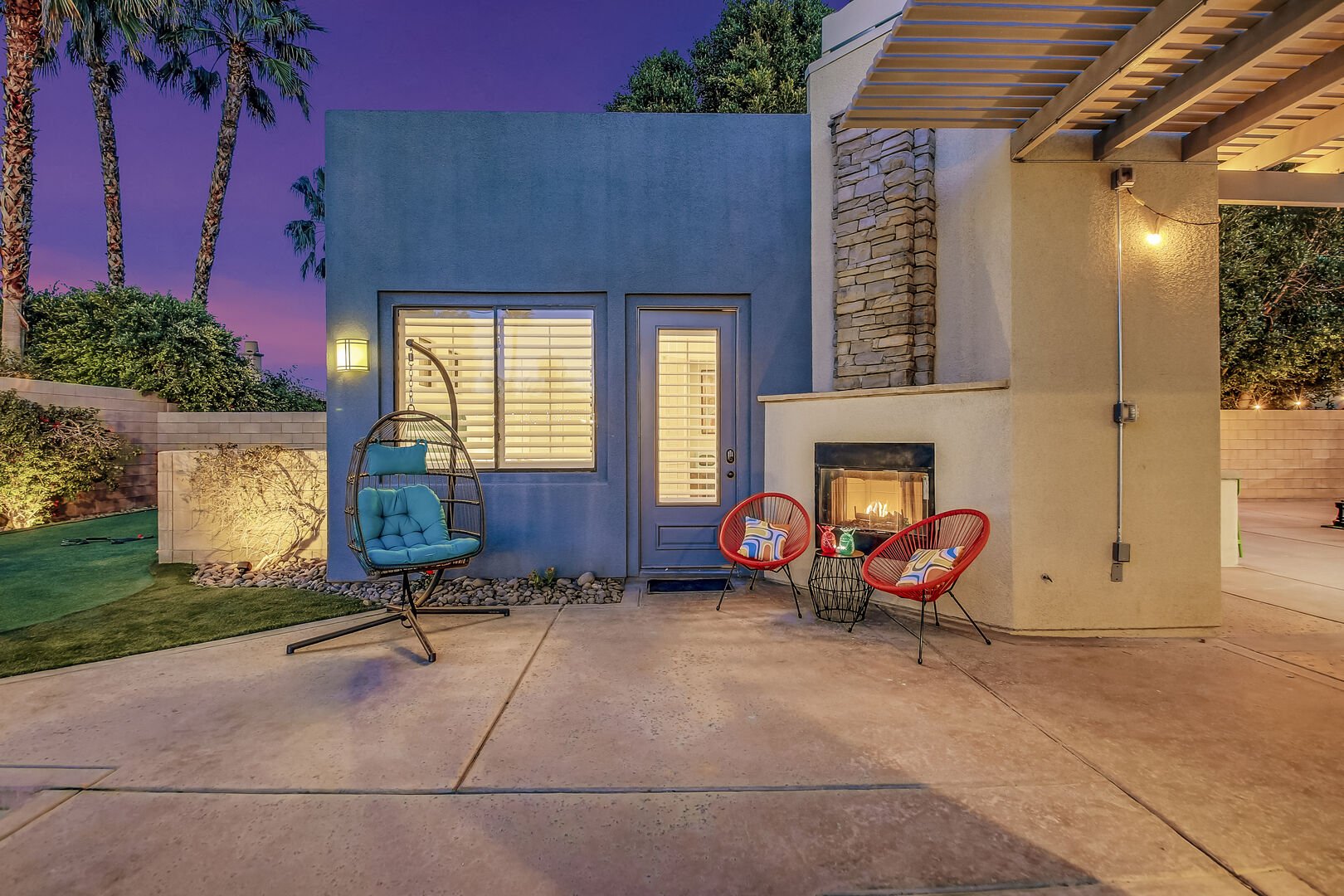Enjoy the outdoor fireplace located just outside the Casita Suite 3.