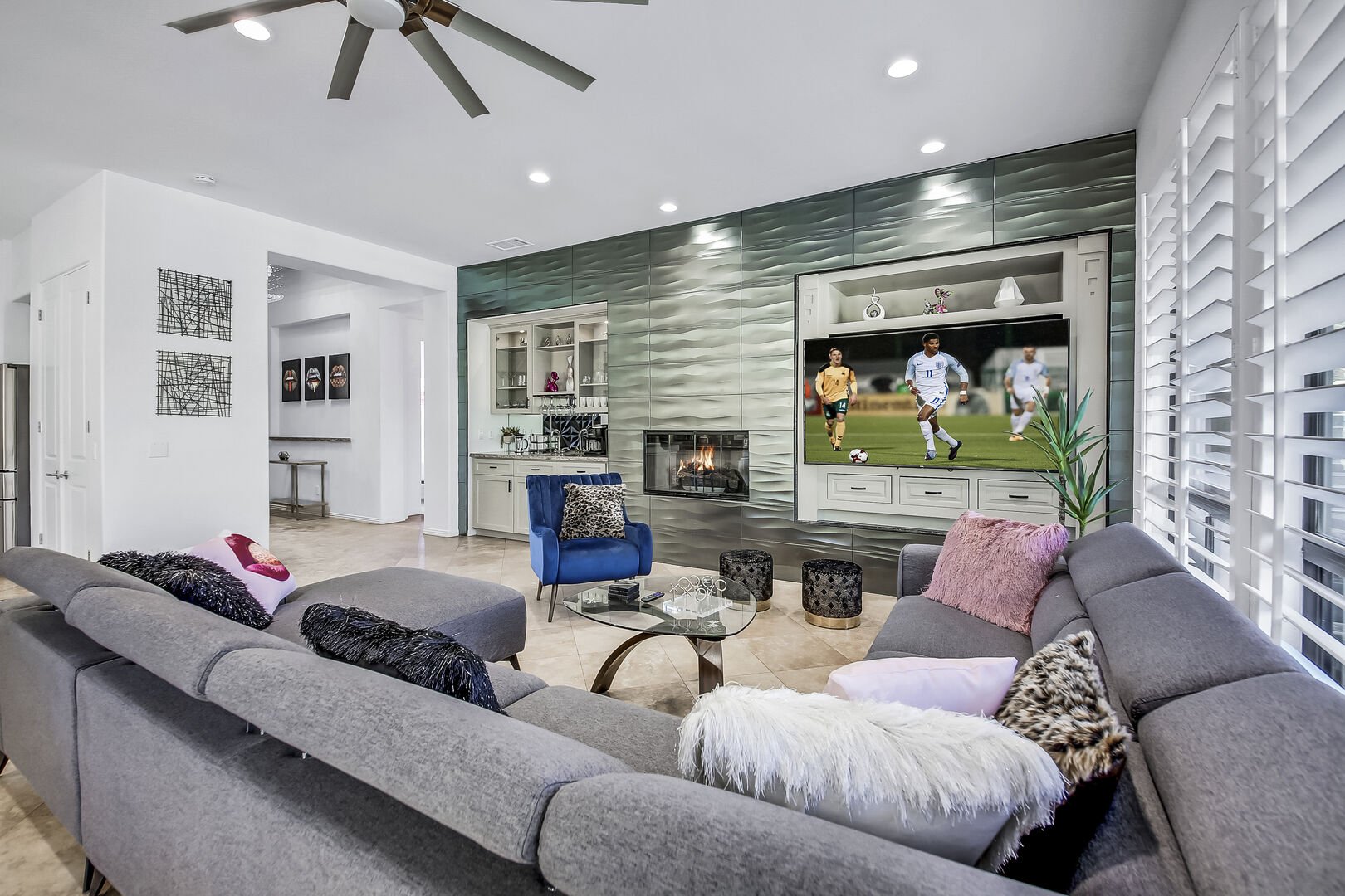 Relax near the natural gas fireplace and remote-controlled ceiling fan.