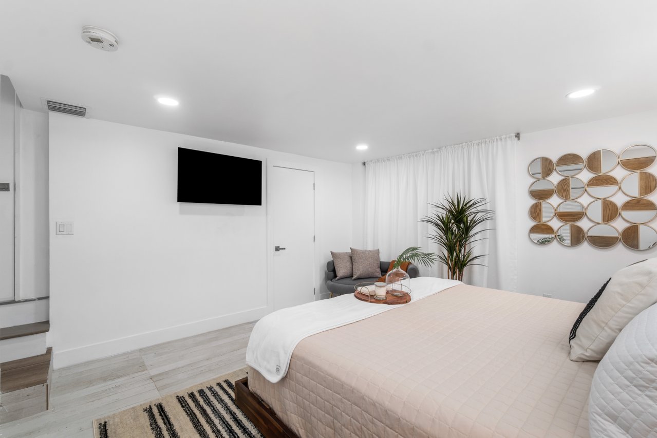 Bedroom two boasts a King Bed, an ensuite bathroom with a shower and a smart TV.