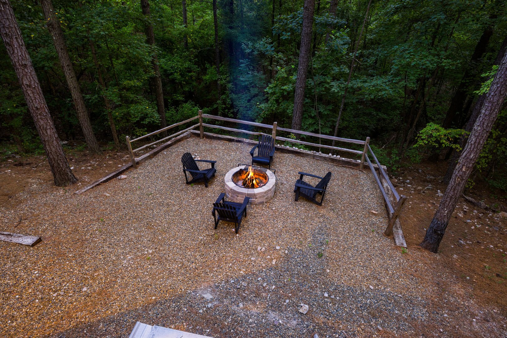 Beautiful fire pit area behind cabin