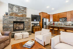 Living Room, Couch, Chairs, Gas Fireplace, TV, Kitchen