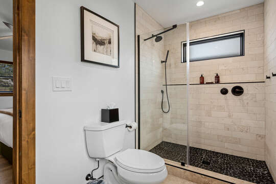 Main level master bathroom with walk in shower