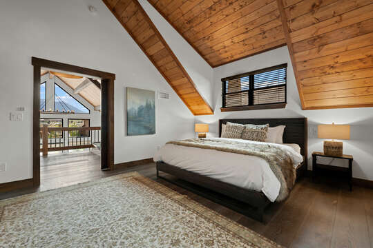 Upper level master bedroom with attached private bathroom