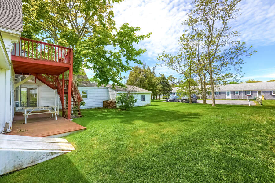 Back yard with stairs to other tenant-191 Sea St Unit 1A- Dennisport-Cape Cod - New England Vacation Rentals