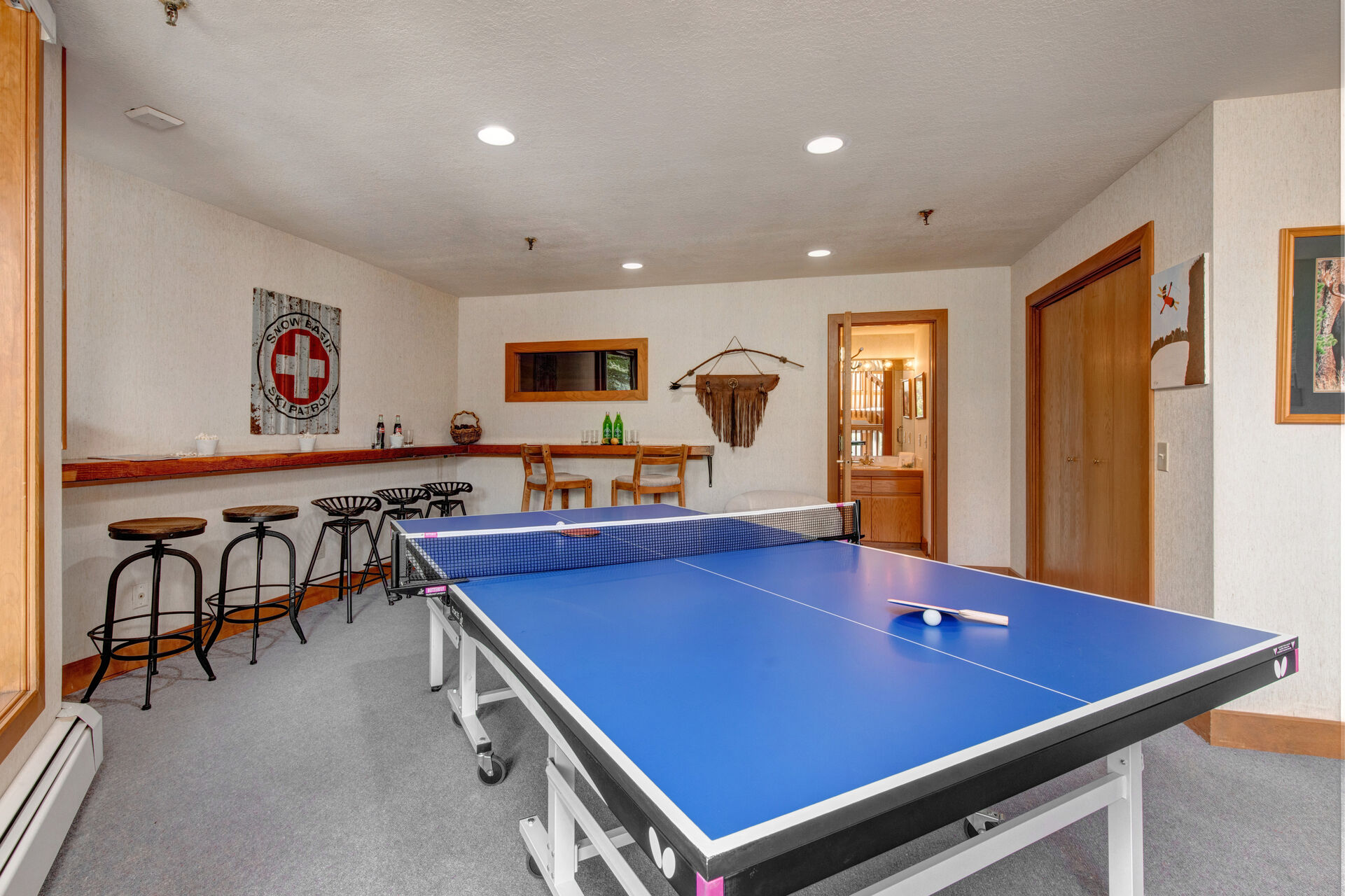 Ping Pong Table and seating area with access to lower level patio