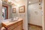 Lower Level Shared Full Bathroom with tile & glass shower and private sauna