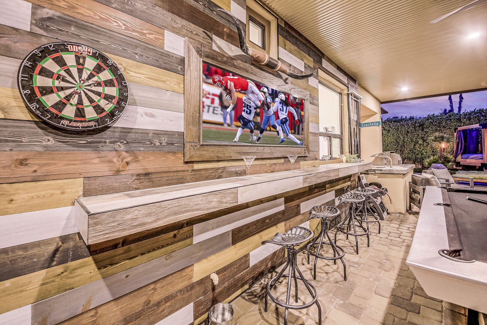 Play a round of darts and enjoy your favorite shows from the smart outdoor TV.