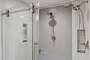 Large walk-in shower with dual shower heads (larger in person than in the photos)