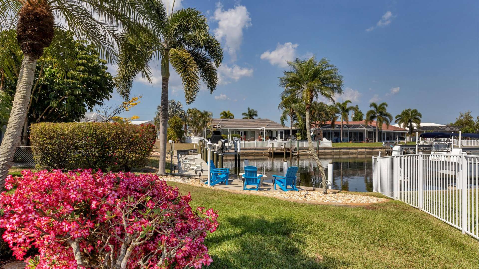 Gorgeous landscaping at this canalfront home in Punta Gorda Isles