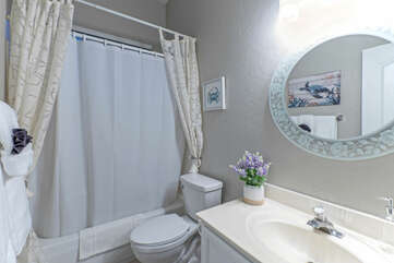 Bathroom 2 with a tub-shower combo is shared between Bedrooms 3 and 4.