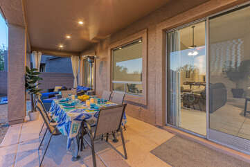 Enjoy outdoor dining with friends and family on the covered back patio.