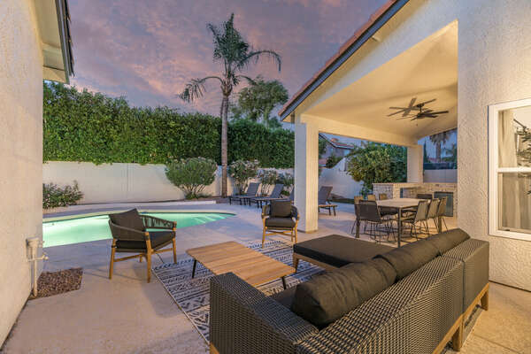 Outdoor Seating w/ Pool & Dining Area in Background