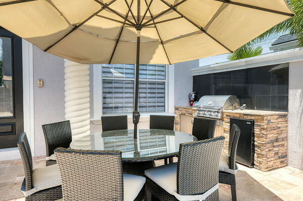 Grill a lunch on the BBQ and dine al fresco at the outdoor dining table