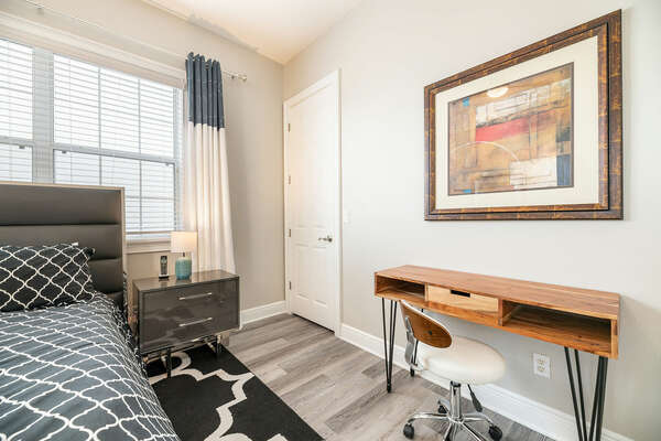 A work desk has been added to this annex bedroom for your convenience