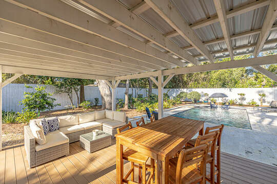 Covered deck is a perfect place for dining or lounging