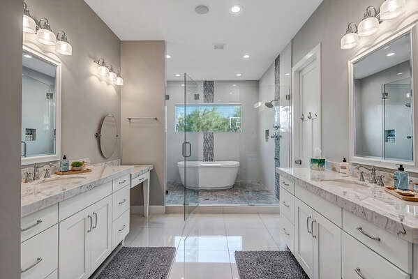 En Suite Master Bathroom with Dual Vanities and Stunning Bath Tub and Shower
