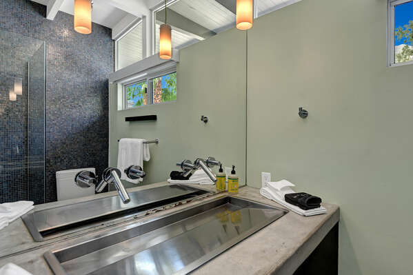 SECOND FULL BATHROOM WITH GLASS SHOWER AND LARGE VANITY AND TILED WALL!