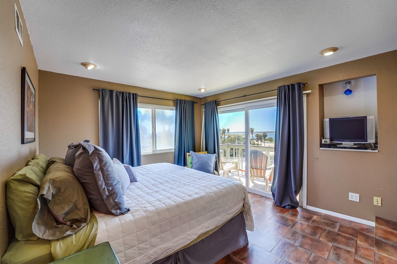 Private master bedroom with king bed, TV with cable, and Mission Bay views from private balcony!