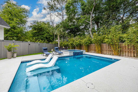 Pool and spa and backyard